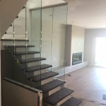 Glass Panel Stairway Railing With Stainless Standoffs